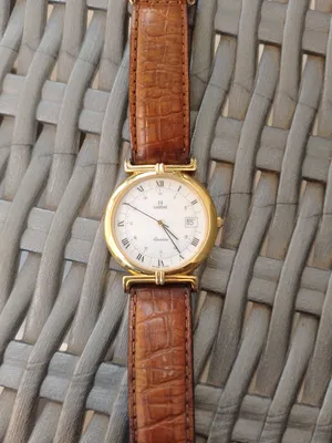 ساعة Quartz gold