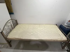 Single steel bed and mattress