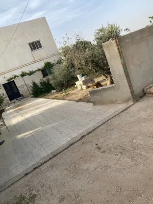 بيت طابقين ع دلمين ارض