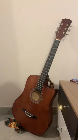 38 inch acoustic guitar with free bag and tuner