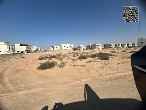 للبيع قطعة أرض سكنية الحليو 1 عجمان زاوية شارعين تملك حر - شاملة الرسوم