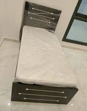Brand new single bed with mattress for sale