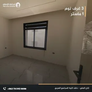 اقشقة طابق ارضي اقساط مباشرة مع ترس وكراج مستقل في تلاع العلي قرب كلية المجتمع العربي بتشطيبات فاخرة