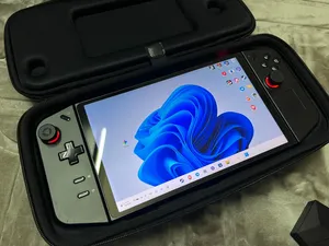للبيع وحش القيمنق المحمول Lenovo legion go z1 Extreme + بكج ملحقات مكتبية