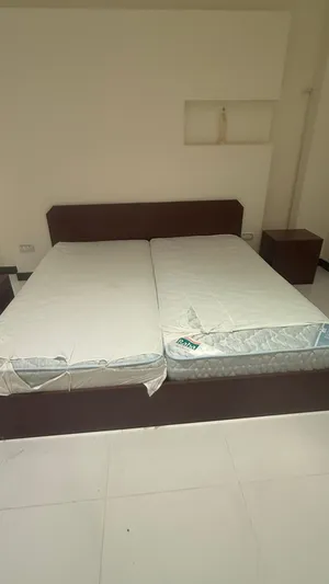 Bed frame king and 2 single mattresses like new