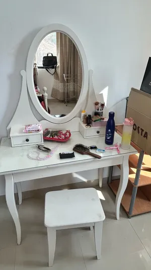 A white Ikea Dressing table with the stool