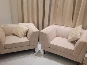 كرسي هوم سنتر قماش وخشب