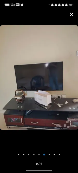 للبيع تلفزيون مع طاولته