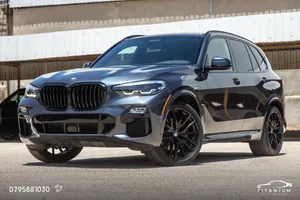 BMW X5 2021 M Package 40i Mild hybrid Black package   فحص كامل  كلين تايتل   السيارة مميزة