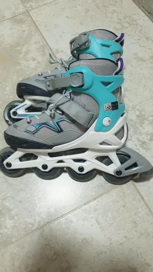 Oxelo blue roller skates (used for one week)
