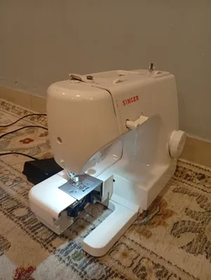 مكينة خياط ملابس للبيع