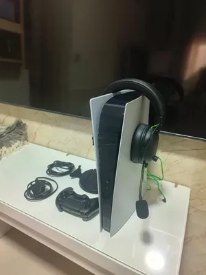 playstation 5 with controller and headset