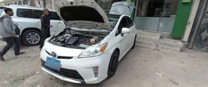 بريوس هيبرد (هجين)مديل 2014 فل كامل لون أبيض كراسي جلد