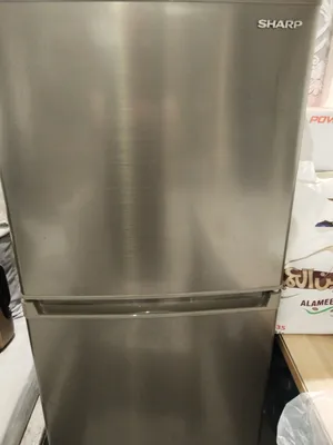 ثلاجه مع فريزر