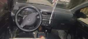سيارة دايهاتسو ميرا 2003 هاتشباك سوداء مع مواصفات يابانية وكشف مجمرك