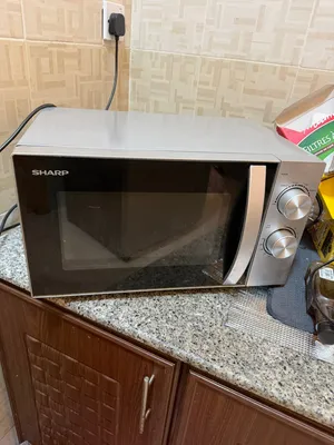 مايكرويف للبيع بحالة ممتازه جدا شبه جديد ماركه شارب microwave sharb