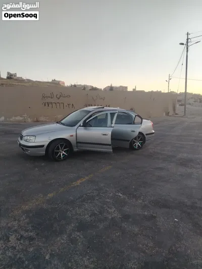 هونداي النترا 2003 اكس دي لون فضي بحاله ممتازه 3