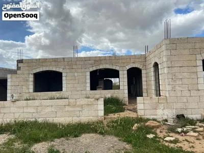 فرصة استثمارية أرض 950م مع بيت حجر – الهاشمية الجديدة 3