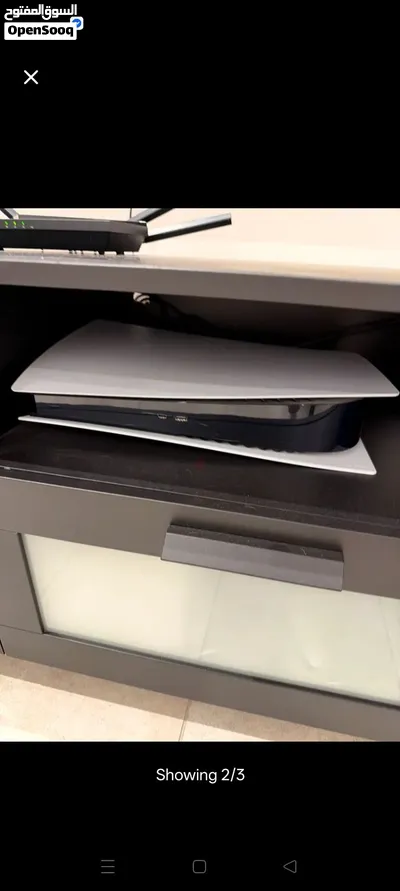 playstation 5 with controller and cables 3