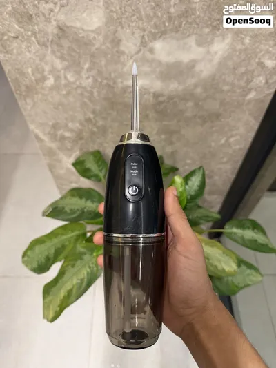جهاز تنظيف الاسنان المعتمد لتنظيف البقايا في الاسنان والتكلسات Water Flosser 2
