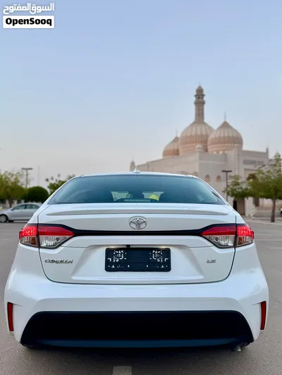 تسجيل جديد تويوتا كورولا 2024 La أبيض لؤلؤي مسرفسه وجاهزه للاستخدام 3