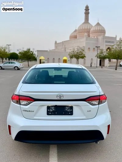 تسجيل جديد تويوتا كورولا 2024 La أبيض لؤلؤي مسرفسه وجاهزه للاستخدام 4