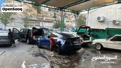 فرصة استثمارية ذهبية محطه غسيل سيارات وكل ما يلزم السيارات في مكان واحد للبيع 2