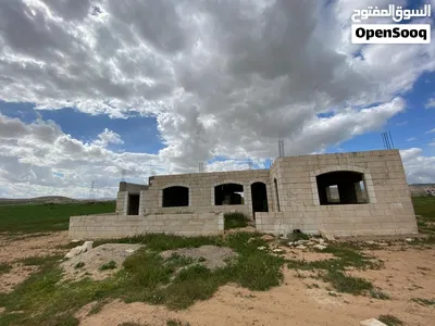 فرصة استثمارية أرض 950م مع بيت حجر – الهاشمية الجديدة 2