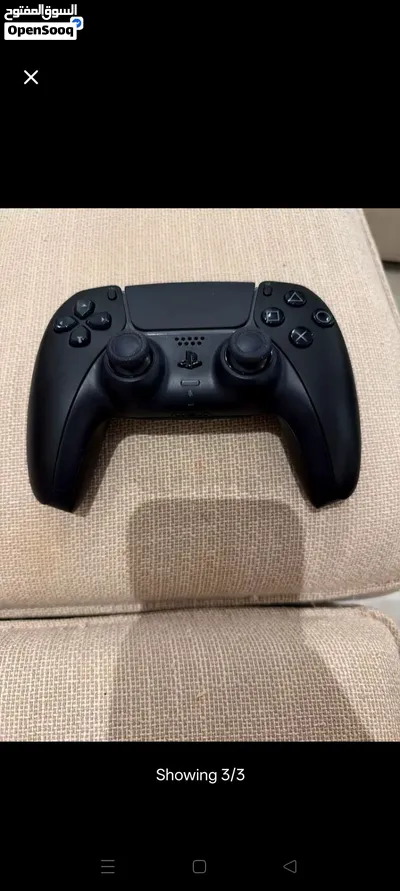 playstation 5 with controller and cables 4
