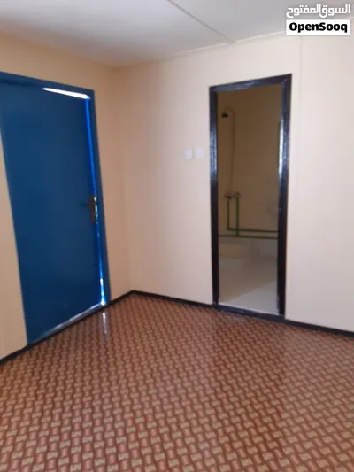 Refurbished plywood portacabin with two rooms and two toilets. 4