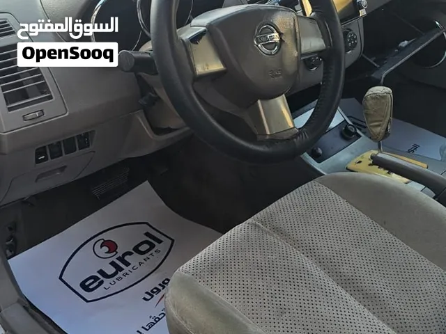 نيسان التيما 2007 رقم بغداد انكليزي باسم زوجتي  السعر 70 وبي مجال
