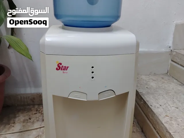 كولر مياه مع قارورة فلتر للبيع – 12 دينار