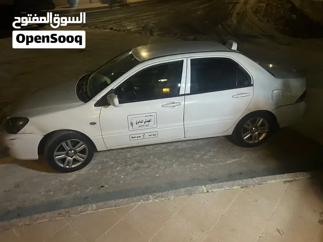 سيارة ميتسوبيشي لانسر 2017 موديل GLX للبيع بحالة جيدة مع مواصفات يابانية للتواصل