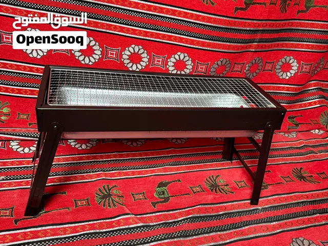 منقلة شوي محمولة جديده توصيل مجاني و سعرها بي مجال
