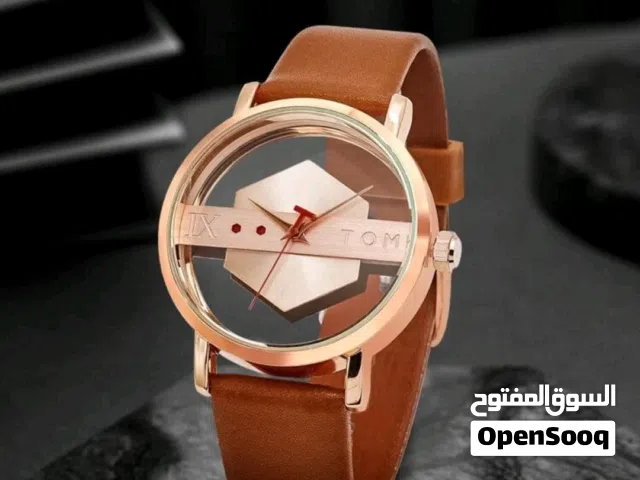 ساعه تومي الانيقه لون ذهبي