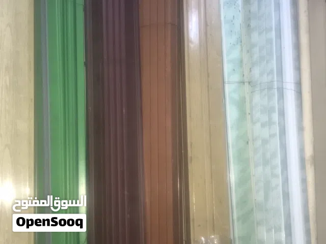 ابواب اوكورديون والواح خشب ارضيات باركيه