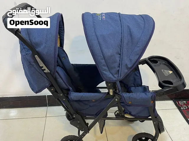 عربانة اطفال توأم مستعملة نظيفة جداً