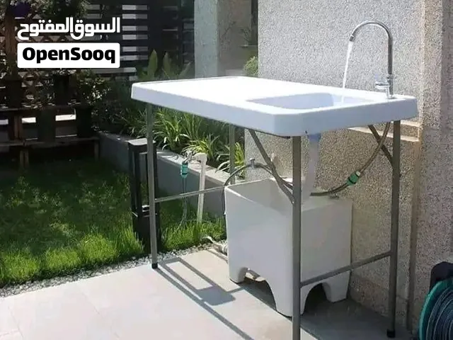 مغسلة متنقلة مع مستلزماتها قابلة للطي