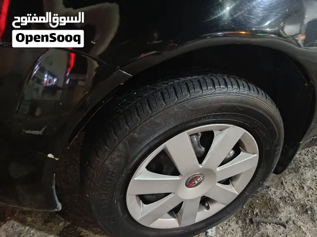 جنط حديد مع طوس كوشوك 3 ماشي حالهم وحده تعبانه قياس 14 براغي قريب للبدل ع اشي راس براس موجود بالزرقا