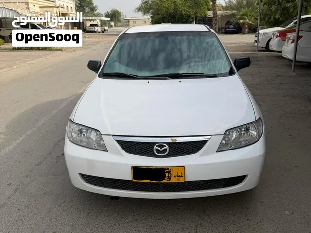 مازدا 323. 2002