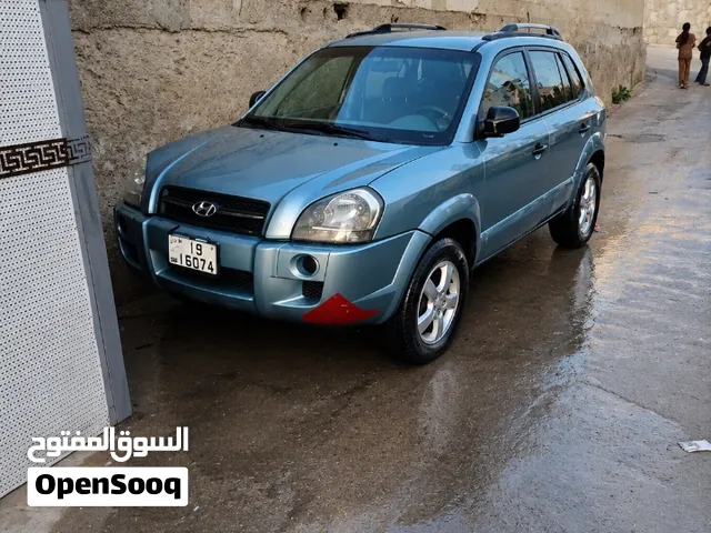 هونداي توسان 2005 فحص 4جيد قير عادي مرخص سنه للستفسار