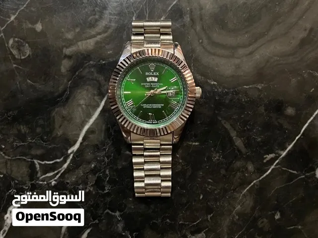 Belle montre style Day-Date, en très bon état.