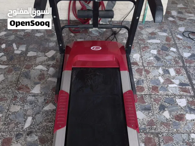 جهاز ركض احمر منزلي