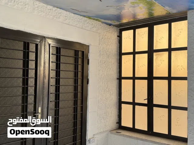 شقة تسوية للبيع خلف بن العميد / دوار الثقافة اربد -شارع البتراء