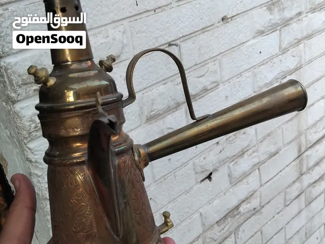 مجموعه مميزه من القطع الجميله والنحاسيات والمزهريات والدلال والهاونات