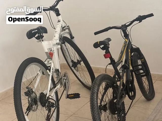 Adult bike ( Upten ) and Kids bike Spartan for sale . name your price