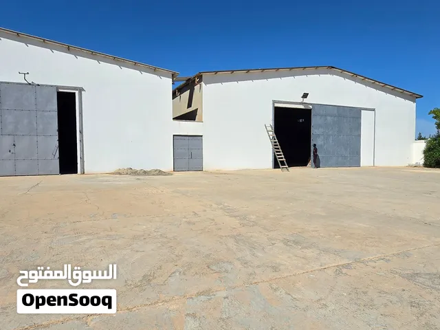 هناجر مخازن بموقع ممتاز عين زارة طريق الابيار لاي مشروع تجاري