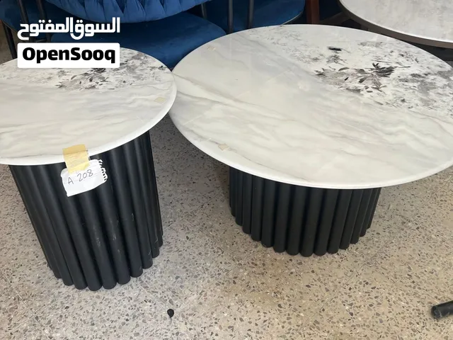 طاولات وسط دائرية وبيضاوي حديد مع خشب وجه رخام طبيعي - موديلات 2027 الفاخرة