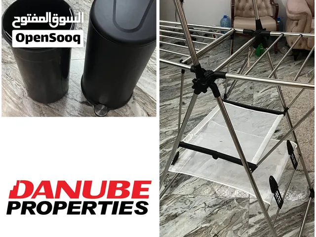 عرض مميز: منشر غسيل ستانلس ستيل + سلة مهملات بدواسة - بحالة ممتازة