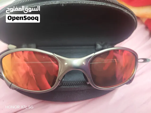 Rare & Authentic Oakley Juliet X-Metal Sunglasses (SKU: 04-114) with Ruby Iridium lenses.